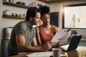 Couple reviewing heating bills